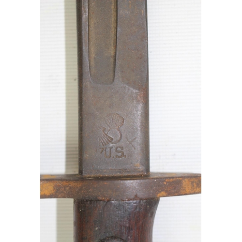 141 - Remington made Model 1918 bayonet as fitted to the US Model 1917 rifle with scabbard. 56cm in Length