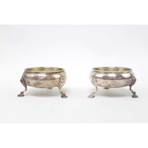 197 - Pair of Silver George III Silver salts each on pad feet with beaded rims. 7cm in Diameter. London 17... 