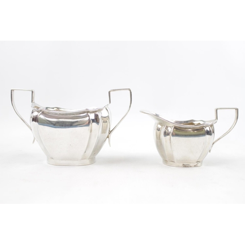 232 - George V Silver Cream Jug and Sugar bowl of oval form Sheffield 1929 by Mannott & Sons 210g total we... 