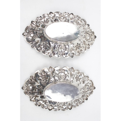 235 - Pair of Silver Pierced embossed dishes by William Devenport Birmingham 1902. 346g total weight