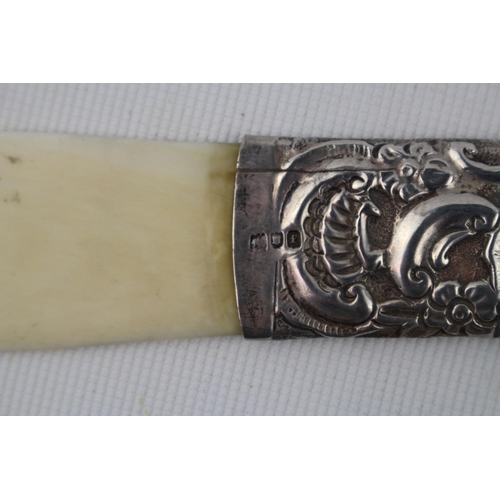 246 - Embossed Silver handled ivory page turner by William Harrison Walter, London 1901