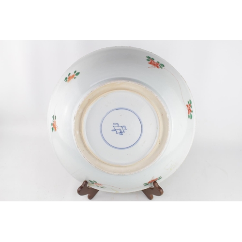 42 - Chinese Kangxi Charger with central floral medallion flanked by Rocky outcrops and lined rim, to rev... 