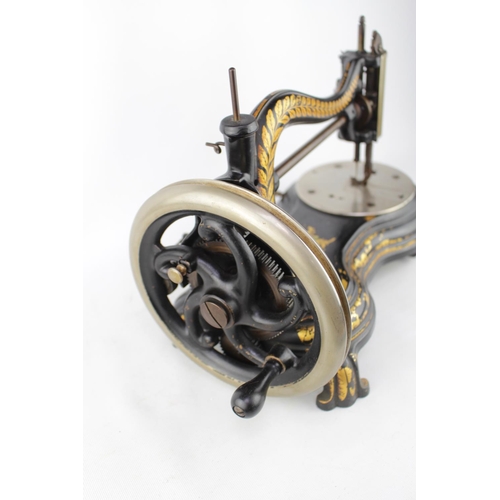 74 - Jones Serpentine Cast Iron Hand crank sewing machine dated 1889 Serial Number 84767