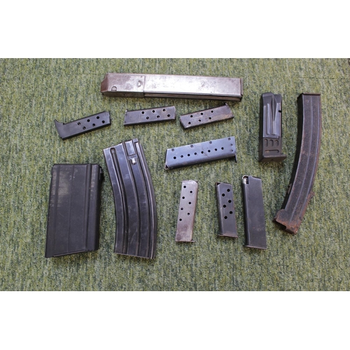 152 - Collection of pistol and machine gun magazines, Sterling, Sten SLR, Webley and Scott automatic pisto... 