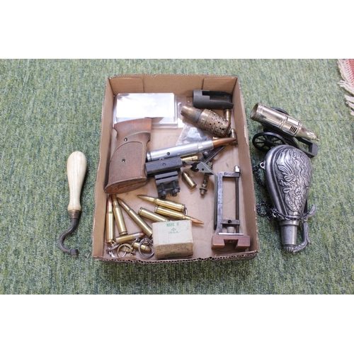 153 - Powder Flask, Bullet key rings, gun grips and other military items