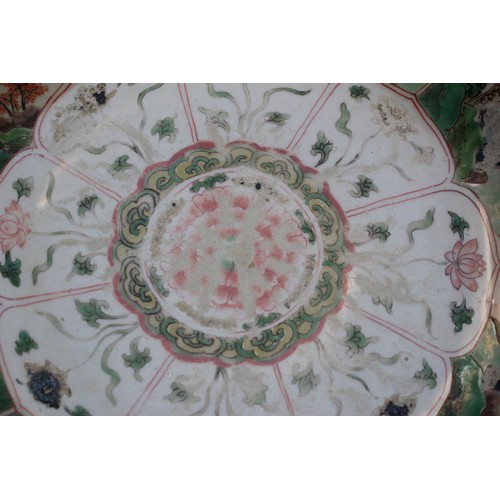 42 - Chinese Kangxi Charger with central floral medallion flanked by Rocky outcrops and lined rim, to rev... 