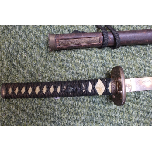 228 - 20thC Japanese Katana/Samurai Sword: Sword with decorative Tsuba with embossed cherry blossom. Faux ... 