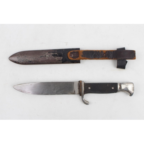 253 - German Third Reich Hitler Youth Pattern Knife. Nickel plated turn up quillon and pommel with two pie... 