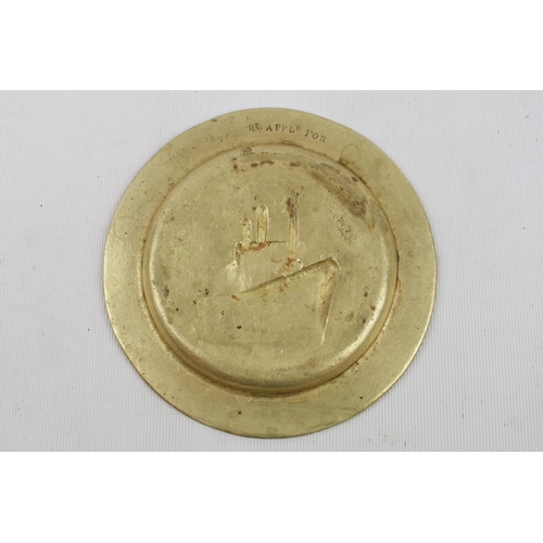 306 - SS Queen Mary Brass Souvenir plate Rd 20797. 12.5cm in Diameter