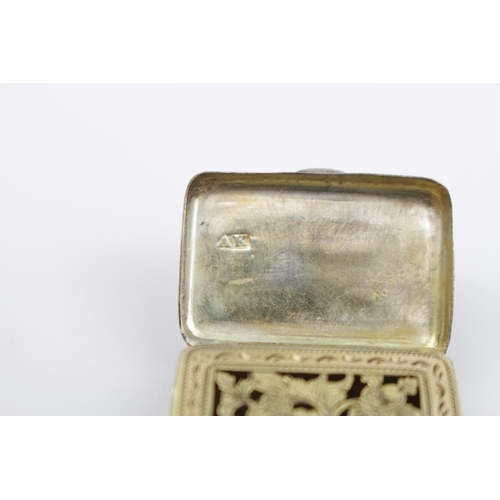 374 - George III Silver Vinaigrette of rectangular form with hinged gilded floral pierced interior. London... 