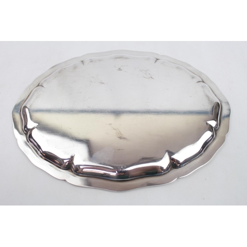 386 - Oval Silver Salver by Jezler of Switzerland. 800 Standard. 260g total weight. 25cm in Diameter