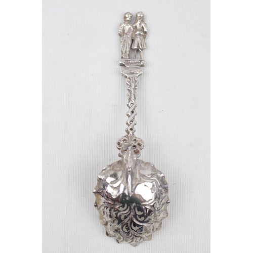 387 - Early 20thC Silver Dutch Spoon with pierced foliate bowl and figural handle. 64g total weight. 17cm ... 