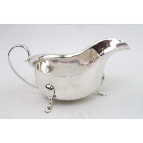 396 - George IV Silver Sauce boat of Georgian style on pad feet Birmingham 1938. 200g total weight