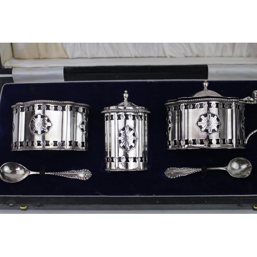 401 - Fine Georgian Style Shaped pierced bright cut cruet set with spoons and blue glass liners. London 19... 