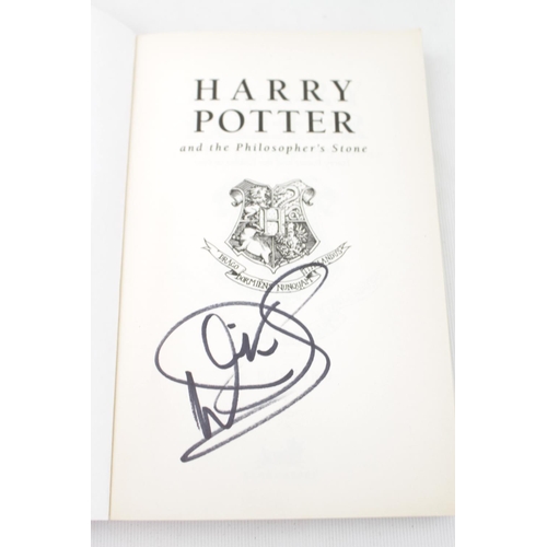 353 - Harry Potter and the Philosophers Stone by J K Rowling paperback signed Warwick Davis  to interior 2... 