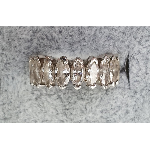 414 - Impressive Ladies 18ct White Gold Diamond Set Eternity ring. Comprising of 16 Marquise pattern Diamo... 