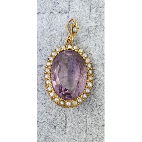 416 - Fine Edwardian 14ct Gold Oval Amethyst Pendant with Seed pear setting. Estimated 10.2ct. 3.2cm in Le... 