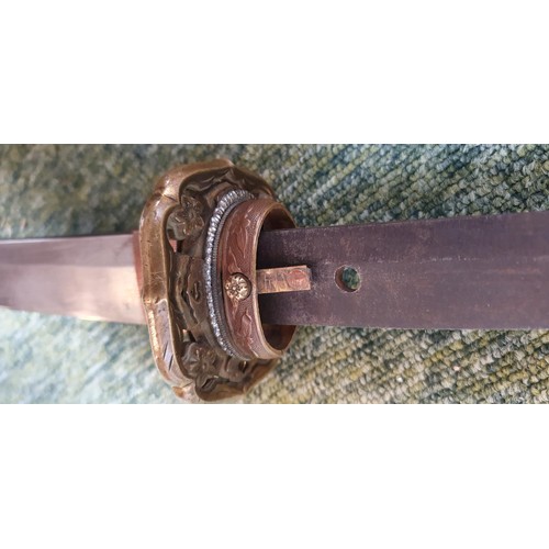 227 - WWII era Japanese Katana/Samurai Sword: Sword with decorative Tsuba with embossed cherry blossom. Sh... 