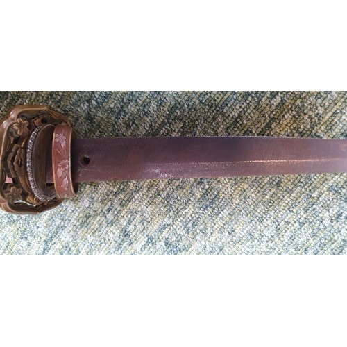 227 - WWII era Japanese Katana/Samurai Sword: Sword with decorative Tsuba with embossed cherry blossom. Sh... 