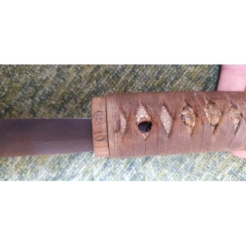 227 - WWII era Japanese Katana/Samurai Sword: Sword with decorative Tsuba with embossed cherry blossom. Sh... 