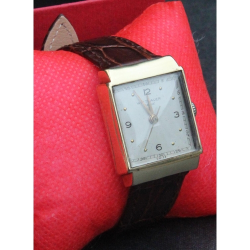 453 - Wittnauer Revue Model 17 Jewels Wristwatch. Wittnauer Revue 10k gold filled square faced manual wind... 