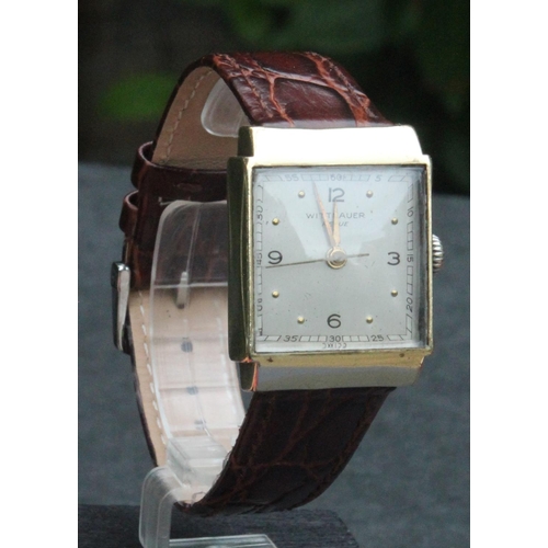 453 - Wittnauer Revue Model 17 Jewels Wristwatch. Wittnauer Revue 10k gold filled square faced manual wind... 