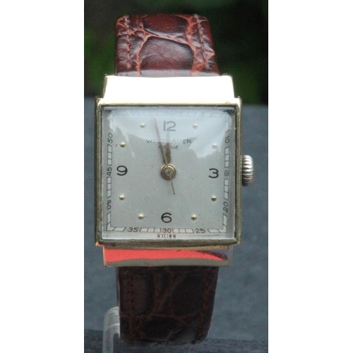 453 - Wittnauer Revue Model 17 Jewels Wristwatch. Wittnauer Revue 10k gold filled square faced manual wind... 