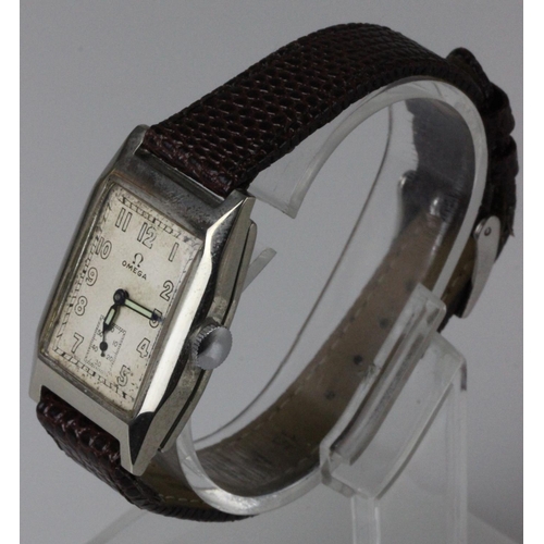 455 - Omega - A gentleman's chrome plated nickel wristwatch circa 1934, the signed cream coloured rectangu... 