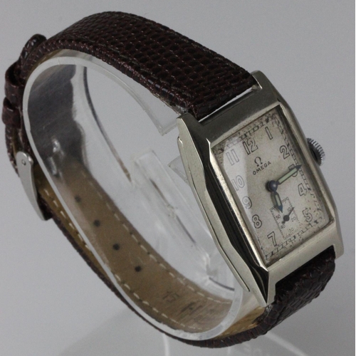 455 - Omega - A gentleman's chrome plated nickel wristwatch circa 1934, the signed cream coloured rectangu... 