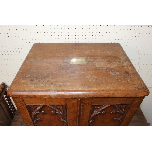 463 - Victorian Walnut cased Cutlery case of 8 Drawers with brass handles within panel carved arched doors... 