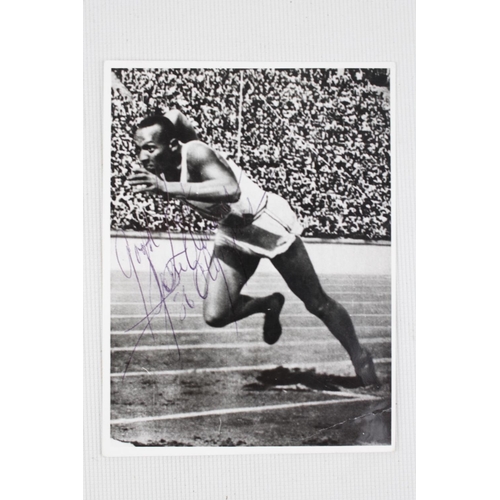 323B - Jesse Owens Olympic Games 1936 signed Sepia Photo 12 x 8cm with COA and a poster