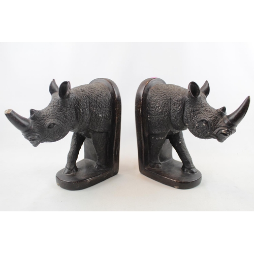 107 - Pair of Large Reconstituted Granite Rhino bookends unsigned. 24cm in Height