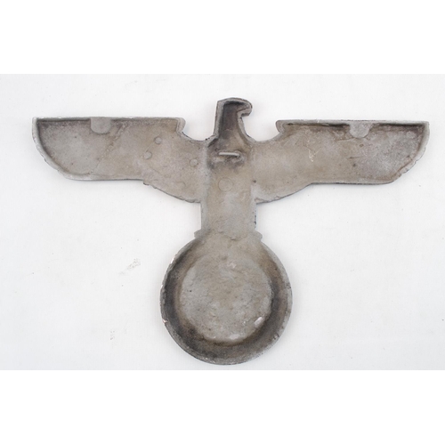 319 - A German Eagle and Swastika cast alloy wall plaque wing span 37cm