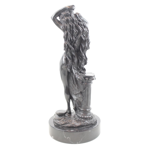 84 - Bronze of a Semi nude woman against Corinthian column mounted on Marble base. 31cm in Height