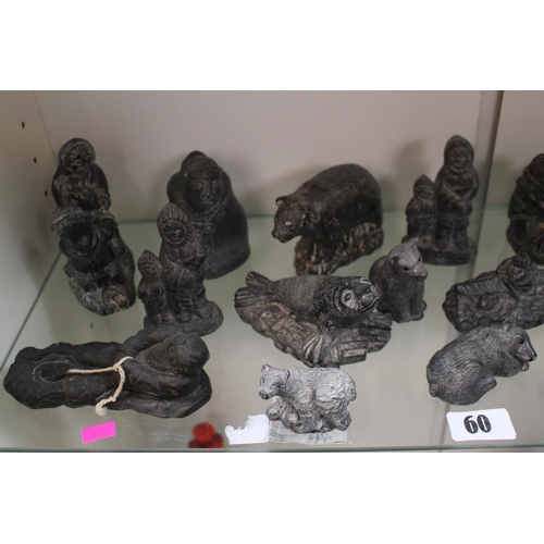 118 - Large Collection of Canadian The Wolf Sculptures inc Inuits, Beaver, Seals etc