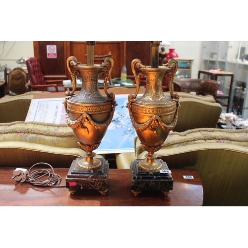 168 - Pair of Gilt Metal two handled urn table lights on squared marble bases supported on gilt feet. 52cm... 