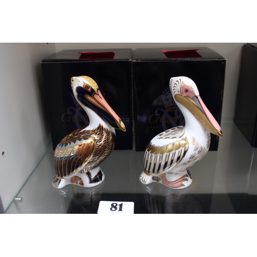 81 - 2 Royal Crown Derby paperweights of Pelicans with Gold stoppers and boxes