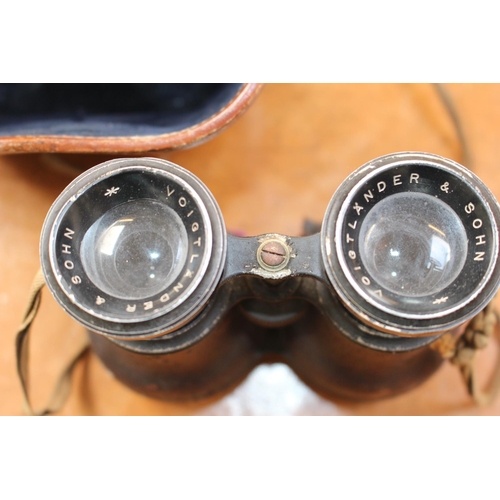 231 - Pair of Leather cased Voigtlander & Sohn Binoculars