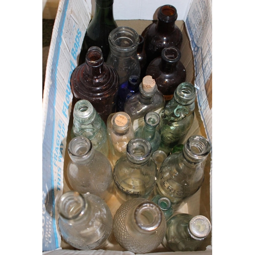 109 - Collection of assorted Advertising bottles and assorted Furs