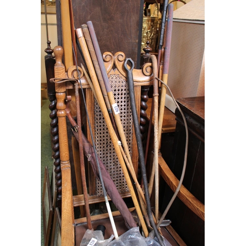 129 - Collection of Vintage Golf Clubs and riding whips and a 9ct Gold topped cane