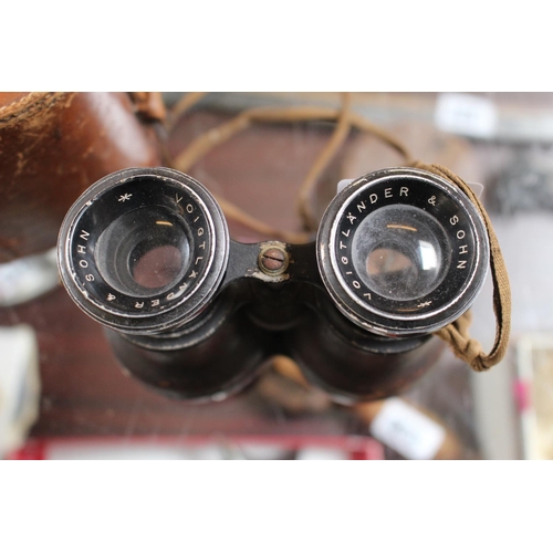 231 - Pair of Leather cased Voigtlander & Sohn Binoculars