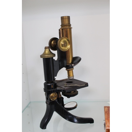 65 - Late 19thC Microscope with E Leitz Wetzlar lens and a box of weights