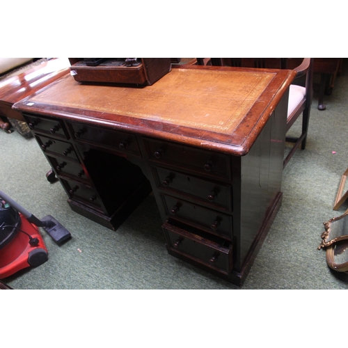 303 - Victorian Mahogany Desk of 9 drawers with turned handles and Leather inset top