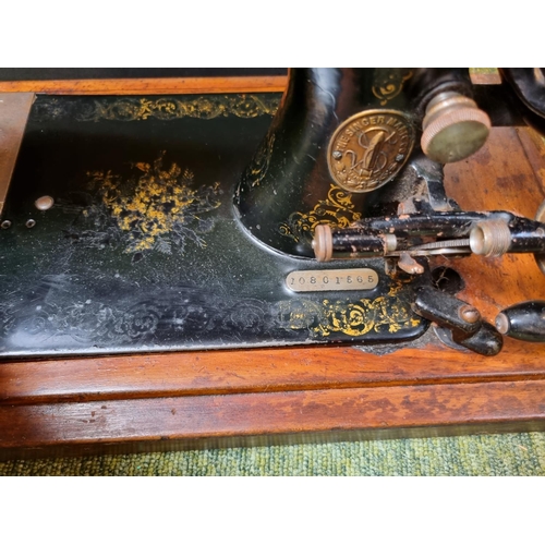 145 - Singer Cased Sewing machine No.10801565