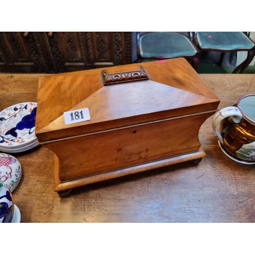 181 - Good quality 19thC Walnut cased Sarcophagus tea caddy with fitted interior supports on carved squat ... 