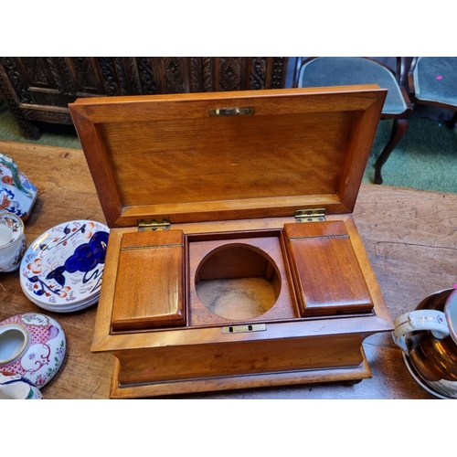 181 - Good quality 19thC Walnut cased Sarcophagus tea caddy with fitted interior supports on carved squat ... 