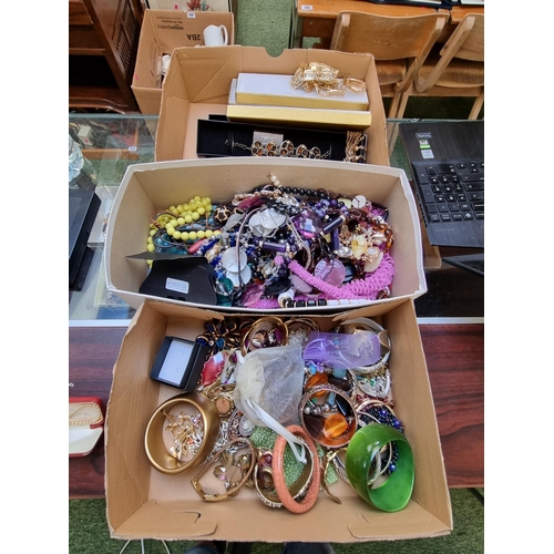 251 - 3 Boxes of assorted Costume jewellery inc. Necklaces, Bangles etc