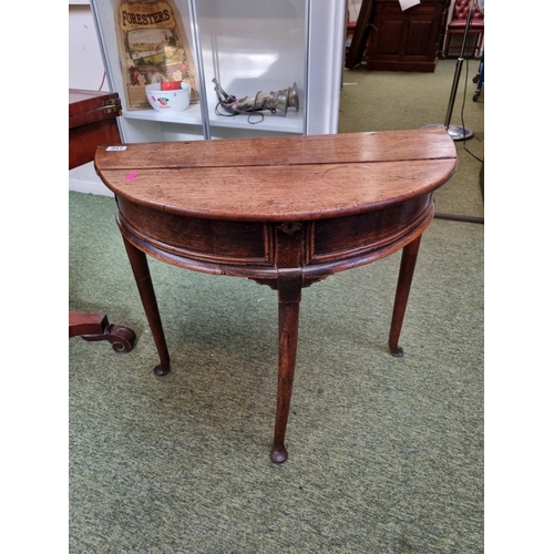 257 - 18thC Oak D table on tapering legs and pad feet