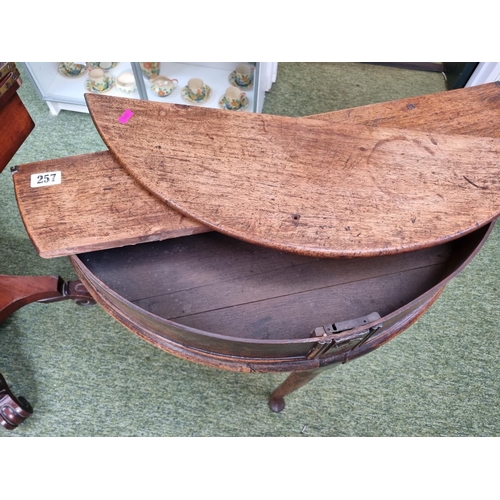 257 - 18thC Oak D table on tapering legs and pad feet