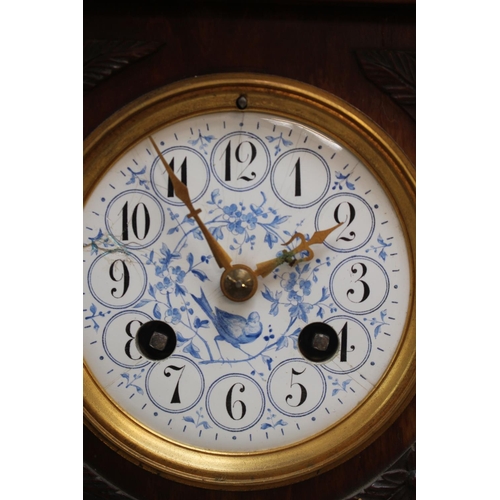 51 - Edwardian Walnut cased mantel clock with enamelled pictorial dial